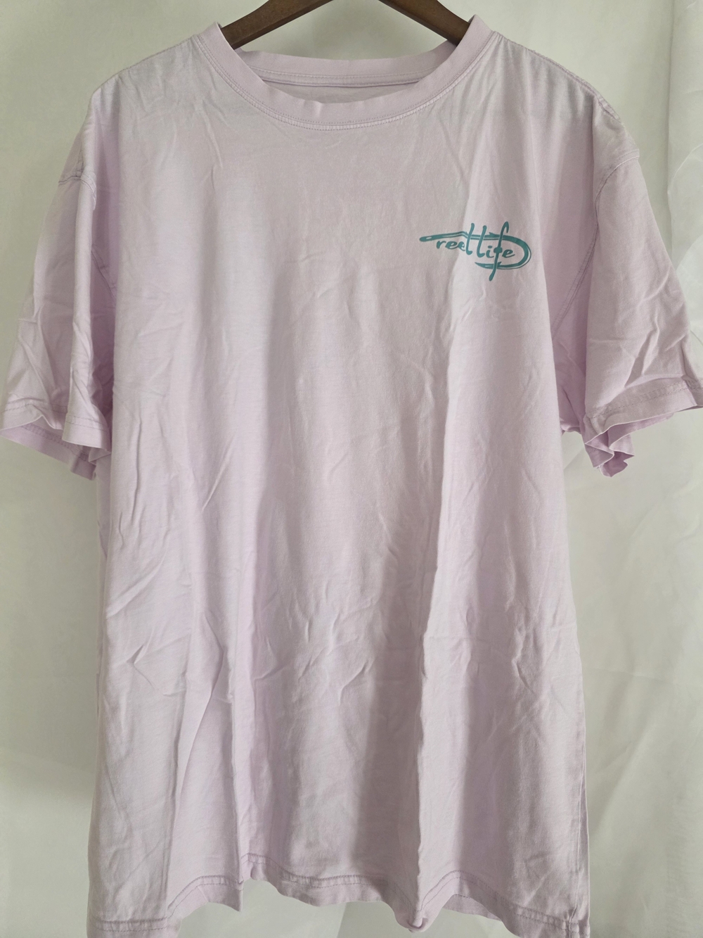 Real Life Men’s Light Pink Crewneck Graphic Tee